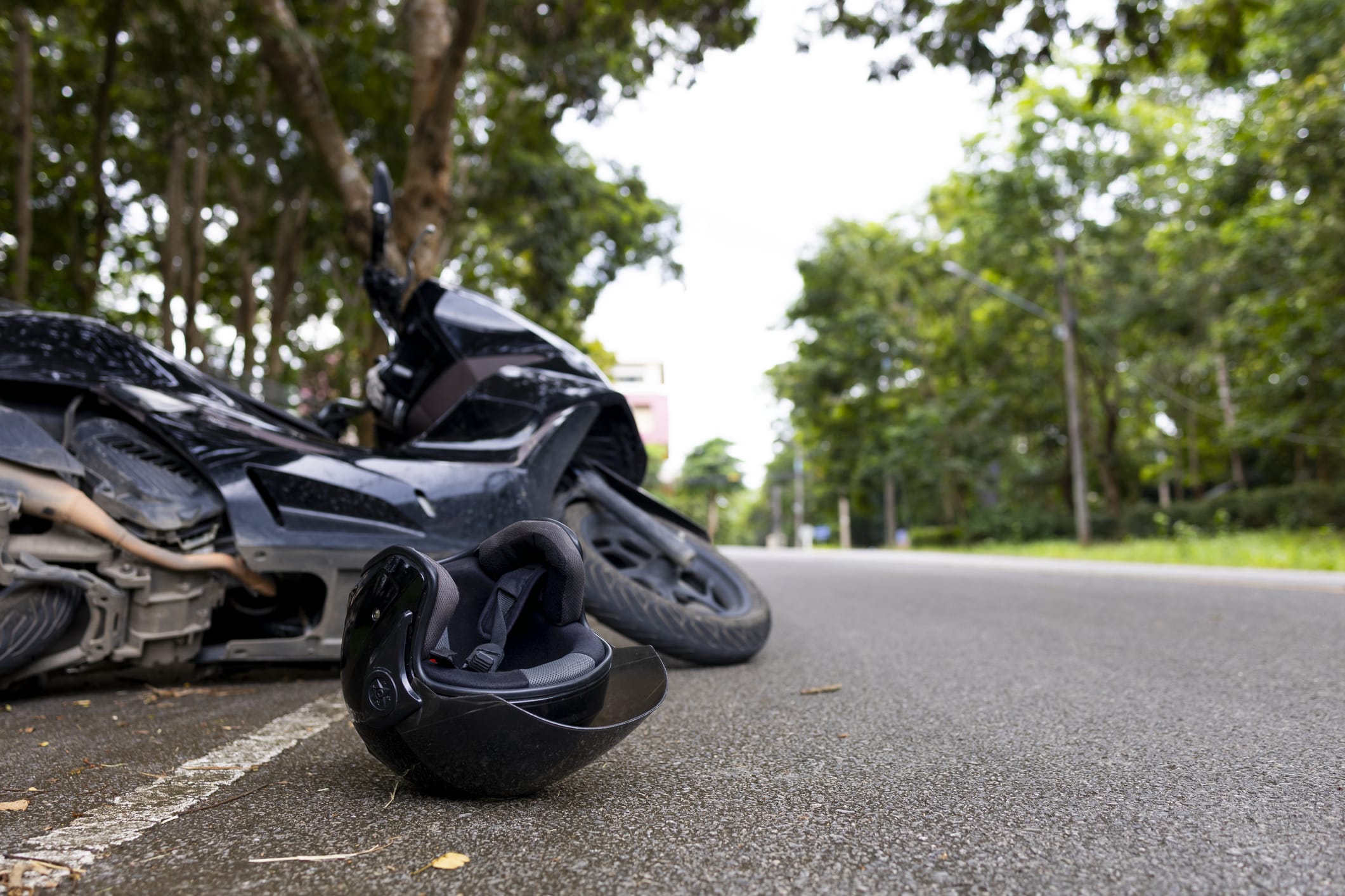 a motorcycle crash shown off frame to represent the motorcycle injury attorneys Theodoros & Rooth